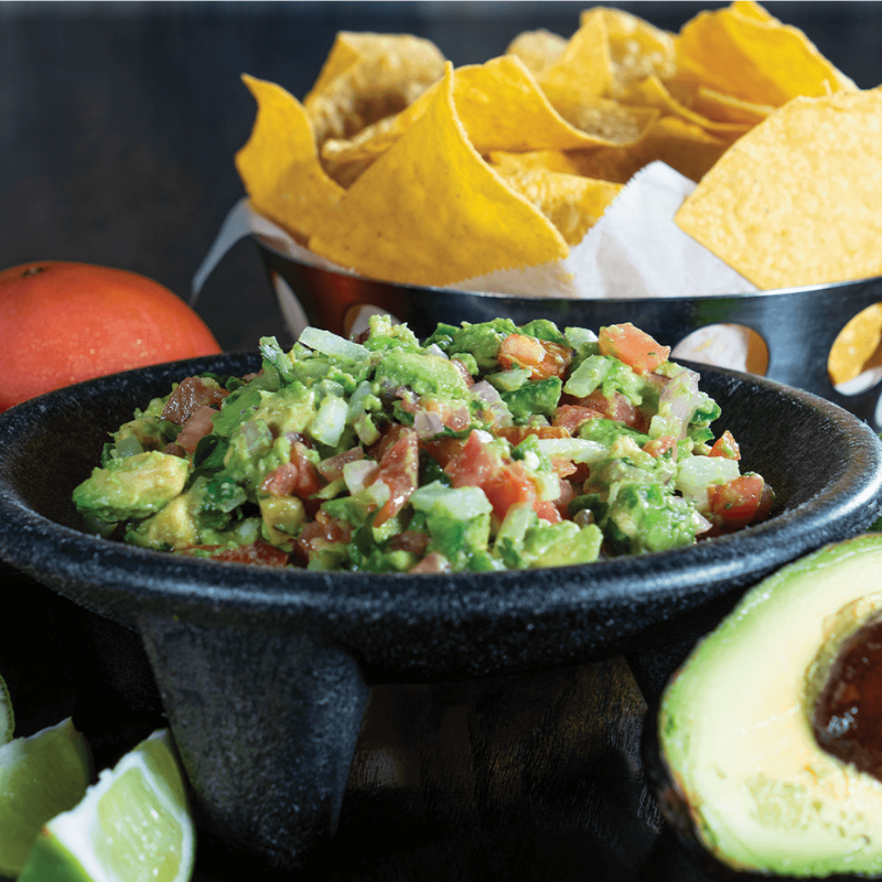 Two avocados, pico de gallo, jalapeno, red onion, cilantro, fresh lime, Cotija cheese, Tobasco & Sweetie Drop peppers, served with roasted salsa & freshly made corn tortilla chips